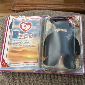 Ty tee is Beanie- Babies 2000 The End Bear in Black with Gold Ribbon